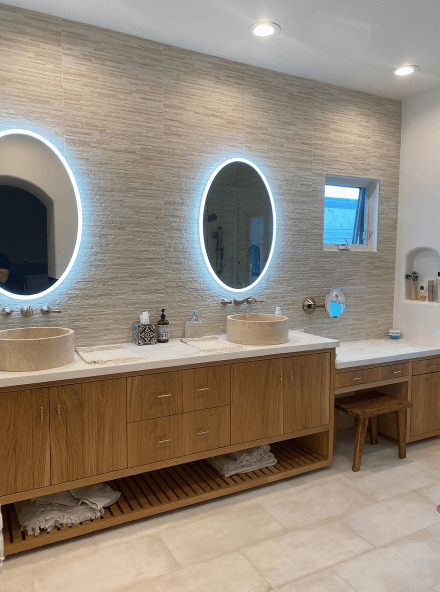 Oak vanity with twin backlit oval mirrors
