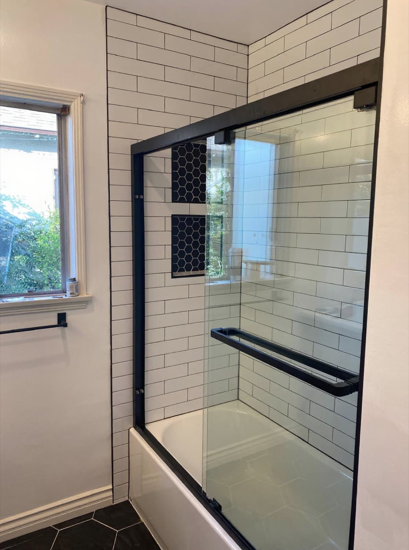 Industrial subway tile with black-frame glass
